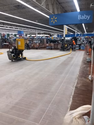 concrete grinding process on Walmart floors